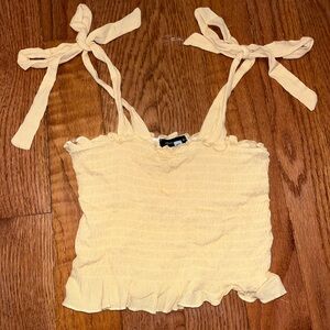 Bow frilly crop tank